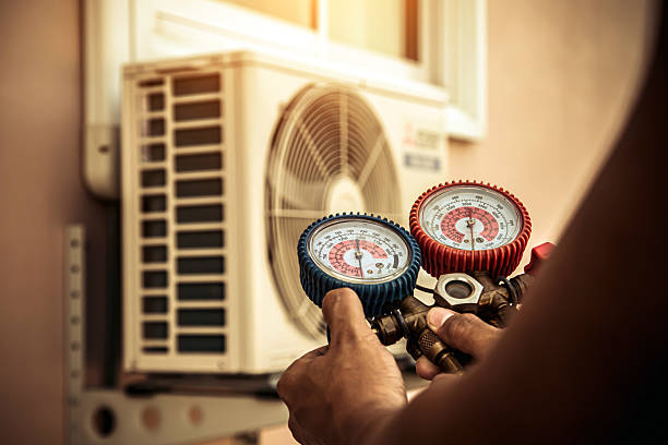 Professional Hvac technician working in Jacksontown, OH